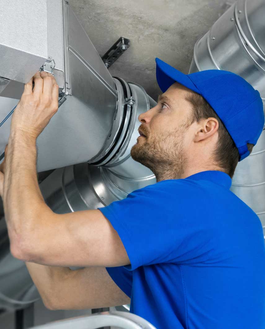 home-service - technician checking air conditioner duct pipe